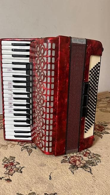 Аккордеон клавишно-кнопочный, красный перламутровый корпус at lalafo.kg Аккордеон клавишно-кнопочный, красный перламутровый корпус
