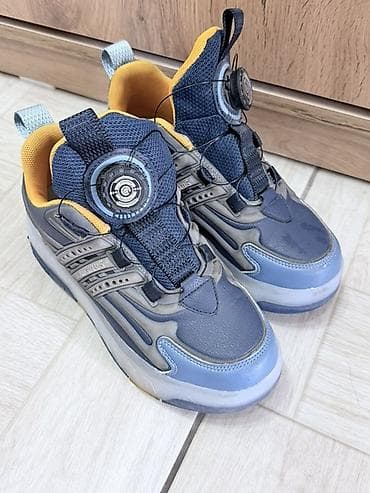 Кроссовки-ролики для детей - Тип: кроссовки с выдвижными колесами в at lalafo.kg Кроссовки-ролики для детей - Тип: кроссовки с выдвижными колесами в