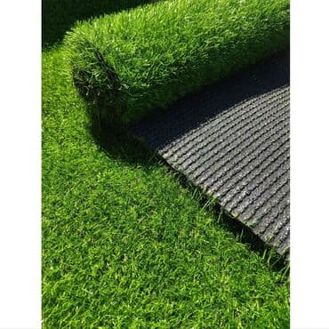 Искусственный газон зеленого цвета с коротким, густым ворсом. Материал at lalafo.kg Искусственный газон зеленого цвета с коротким, густым ворсом. Материал