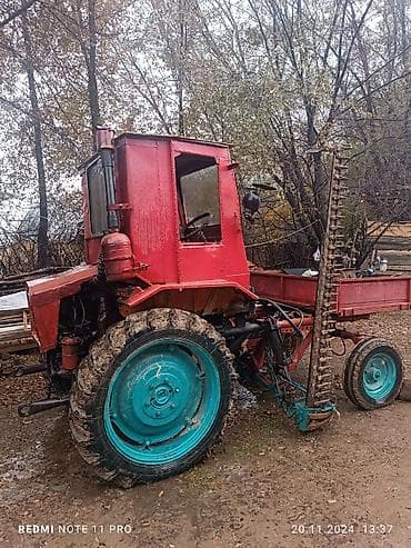 Колёсный трактор с прицепной тележкой и сегментной косилкой - Тип at lalafo.kg Колёсный трактор с прицепной тележкой и сегментной косилкой - Тип