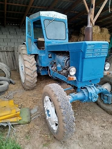 Трактор колесный, с кабиной, окраска синим цветом. Основные at lalafo.kg Трактор колесный, с кабиной, окраска синим цветом. Основные