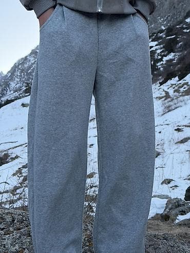Серые спортивные брюки свободного кроя - Цвет: меланжевый серый - at lalafo.kg Серые спортивные брюки свободного кроя - Цвет: меланжевый серый -