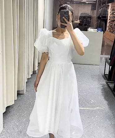 Белое женское платье миди из легкой полупрозрачной ткани с подкладкой at lalafo.kg Белое женское платье миди из легкой полупрозрачной ткани с подкладкой