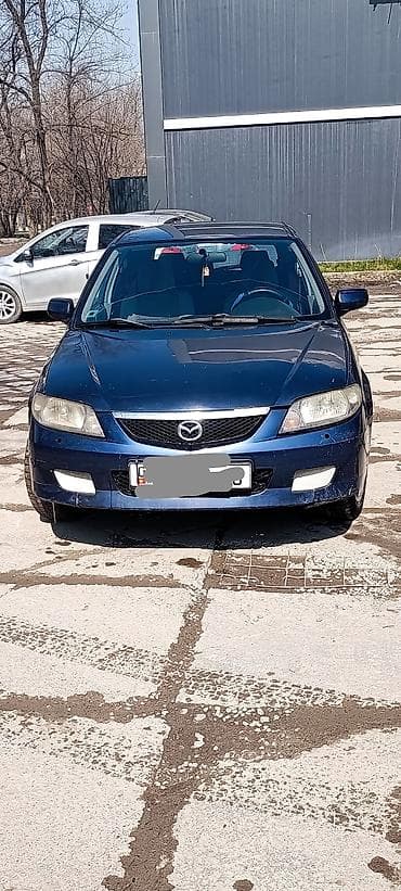 Mazda 323: 2003 г., 1.6 л, Механика, Бензин, Универсал at lalafo.kg Mazda 323: 2003 г., 1.6 л, Механика, Бензин, Универсал