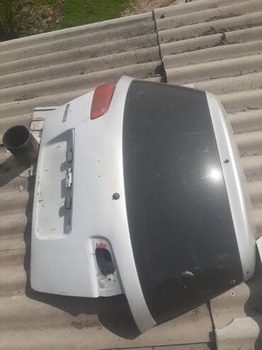 Стекло Багажника Mazda, 2002 г., Б/у, Оригинал at lalafo.kg Стекло Багажника Mazda, 2002 г., Б/у, Оригинал