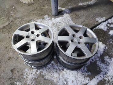 Литые Диски R 15 Honda, Комплект, отверстий - 4, Б/у at lalafo.kg Литые Диски R 15 Honda, Комплект, отверстий - 4, Б/у