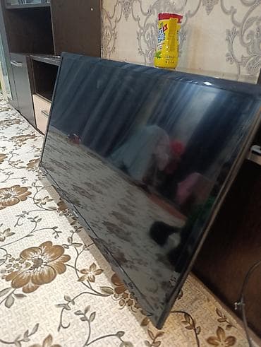 LED телевизор, диагональ около 32–40". Плоская панель, тонкая рамка по at lalafo.kg LED телевизор, диагональ около 32–40". Плоская панель, тонкая рамка по
