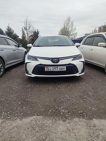 Toyota Corolla: 2022 г., 1.8 л, Вариатор, Гибрид, Седан at lalafo.kg Toyota Corolla: 2022 г., 1.8 л, Вариатор, Гибрид, Седан