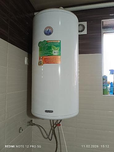 Накопительный водонагреватель Объем бака: 100 л, DeLuxe, Электрический, Регулятор температуры, Нержавейка, Б/у at lalafo.kg Накопительный водонагреватель Объем бака: 100 л, DeLuxe, Электрический, Регулятор температуры, Нержавейка, Б/у