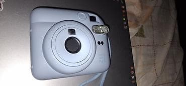 Fujifilm Instax Mini 12 — компактная моментальная камера at lalafo.kg Fujifilm Instax Mini 12 — компактная моментальная камера