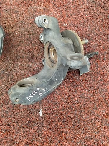 Цапфа Mazda Axela BK5P 2007 перед. лев. (б/у) at lalafo.kg Цапфа Mazda Axela BK5P 2007 перед. лев. (б/у)