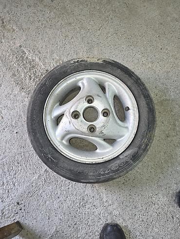 Литые Диски R <13 1 шт, отверстий - 4, Б/у at lalafo.kg Литые Диски R <13 1 шт, отверстий - 4, Б/у