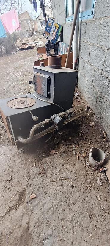 Твердотопливная печь-камин с варочной поверхностью и контуром водяного at lalafo.kg — 1 Твердотопливная печь-камин с варочной поверхностью и контуром водяного — 1