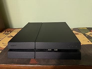 PlayStation 4 (PS4) 500 GB + 1 оригинальный джойстик + 7 игр Продаю at lalafo.kg PlayStation 4 (PS4) 500 GB + 1 оригинальный джойстик + 7 игр Продаю