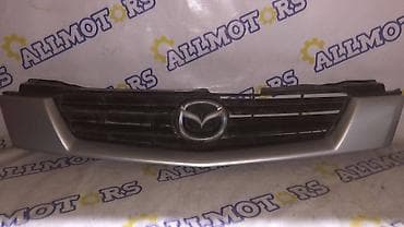 Решетка радиатора Mazda Б/у, Оригинал at lalafo.kg Решетка радиатора Mazda Б/у, Оригинал