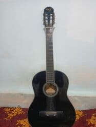 Классическая акустическая гитара MR’s, черный глянцевый корпус at lalafo.kg Классическая акустическая гитара MR’s, черный глянцевый корпус