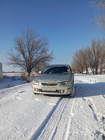 Mazda Familia: 2000 г., 1.8 л, Механика, Бензин, Универсал at lalafo.kg Mazda Familia: 2000 г., 1.8 л, Механика, Бензин, Универсал