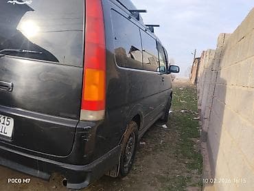 Минивэн черного цвета с боковыми сдвижными дверями с обеих сторон at lalafo.kg Минивэн черного цвета с боковыми сдвижными дверями с обеих сторон