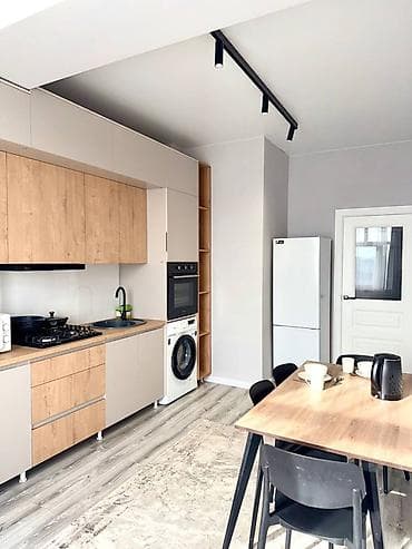 Светлая современная студия с полноценной кухней и спальным местом at lalafo.kg Светлая современная студия с полноценной кухней и спальным местом