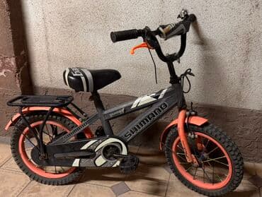 Возраст: 3-6 лет Велосипед в черно-оранжевой расцветке at lalafo.kg Возраст: 3-6 лет Велосипед в черно-оранжевой расцветке