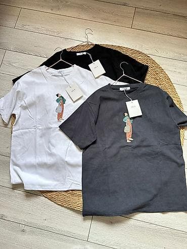 Футболки унисекс с принтом «девушка с сумкой» - Материал: плотный at lalafo.kg Футболки унисекс с принтом «девушка с сумкой» - Материал: плотный