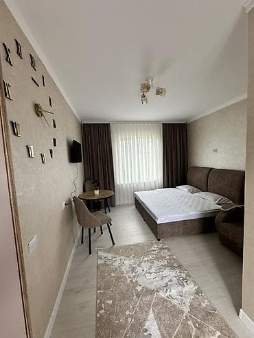 Уютный номер-студия в спокойных бежево‑серых тонах. - Просторная at lalafo.kg Уютный номер-студия в спокойных бежево‑серых тонах. - Просторная