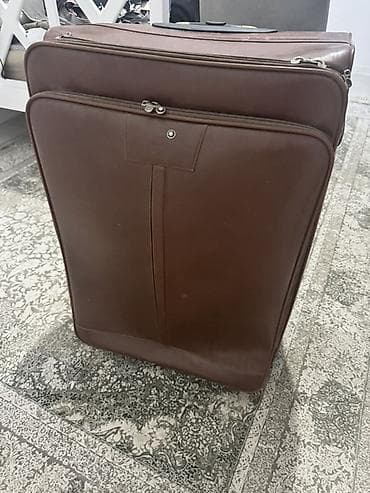Большой дорожный чемодан на колесах - Материал: коричневая at lalafo.kg Большой дорожный чемодан на колесах - Материал: коричневая
