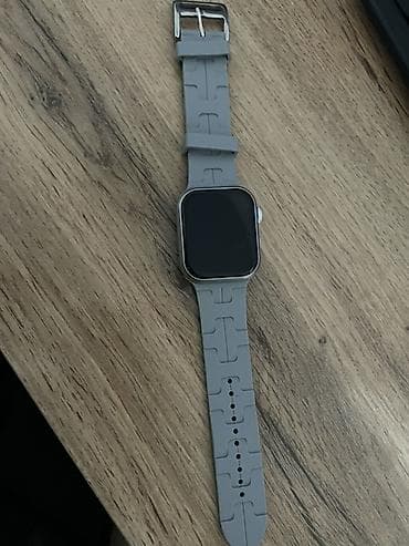 Умные часы с прямоугольным экраном и серым силиконовым ремешком at lalafo.kg Умные часы с прямоугольным экраном и серым силиконовым ремешком