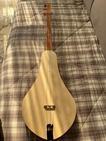 Срочно жаңы өрүк комуз сатылат, туюк чабылган калың чехолун белекке at lalafo.kg Срочно жаңы өрүк комуз сатылат, туюк чабылган калың чехолун белекке