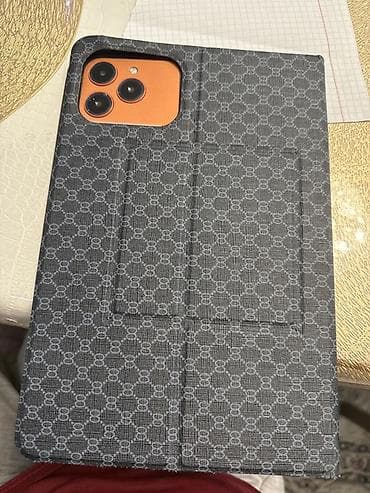 Чехол-книжка для планшета с вырезом под тройную камеру. Клавиатура at lalafo.kg Чехол-книжка для планшета с вырезом под тройную камеру. Клавиатура