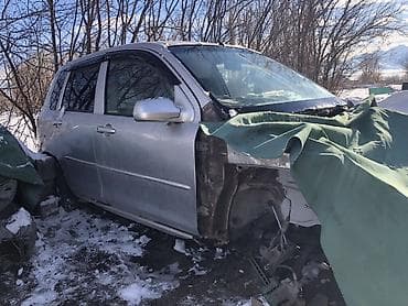 Mazda Verisa, серебристый хэтчбек, продаётся на разбор по запчастям at lalafo.kg Mazda Verisa, серебристый хэтчбек, продаётся на разбор по запчастям