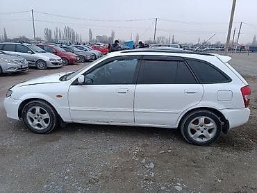 Mazda Familia: 2001 г., 1.5 л, Автомат, Бензин, Универсал at lalafo.kg — 3 Mazda Familia: 2001 г., 1.5 л, Автомат, Бензин, Универсал — 3