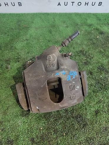 Передний левый суппорт Mazda at lalafo.kg Передний левый суппорт Mazda