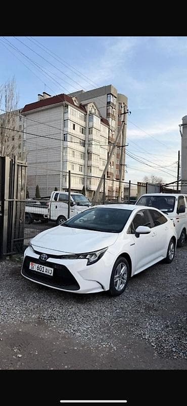 Toyota Corolla: 2021 Π³., 1.8 Π», ΠΠ°ΡΠΈΠ°ΡΠΎΡ, ΠΠΈΠ±ΡΠΈΠ΄, Π‘Π΅Π΄Π°Π½ at lalafo.kg Toyota Corolla: 2021 Π³., 1.8 Π», ΠΠ°ΡΠΈΠ°ΡΠΎΡ, ΠΠΈΠ±ΡΠΈΠ΄, Π‘Π΅Π΄Π°Π½