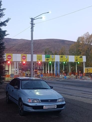 Toyota Carina E: 1995 г., 1.6 л, Механика, Бензин, Хэтчбэк at lalafo.kg Toyota Carina E: 1995 г., 1.6 л, Механика, Бензин, Хэтчбэк