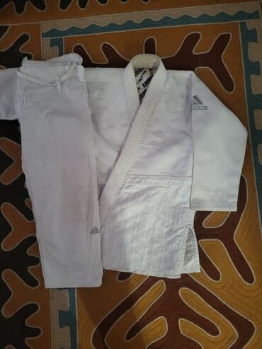 Кимоно для дзюдо Adidas (комплект куртка + штаны). - Цвет: белый - at lalafo.kg Кимоно для дзюдо Adidas (комплект куртка + штаны). - Цвет: белый -