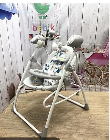 Детские электронные качели-стульчик с игрушками и столиком. - at lalafo.kg Детские электронные качели-стульчик с игрушками и столиком. -