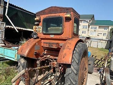 Трактор с прицепом и навесным оборудованием Описание: - Колесный at lalafo.kg Трактор с прицепом и навесным оборудованием Описание: - Колесный