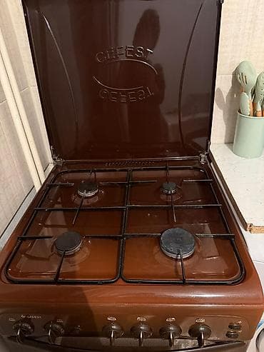 Газовая плита GEFEST, коричневая эмаль - 4 газовые конфорки разной at lalafo.kg Газовая плита GEFEST, коричневая эмаль - 4 газовые конфорки разной