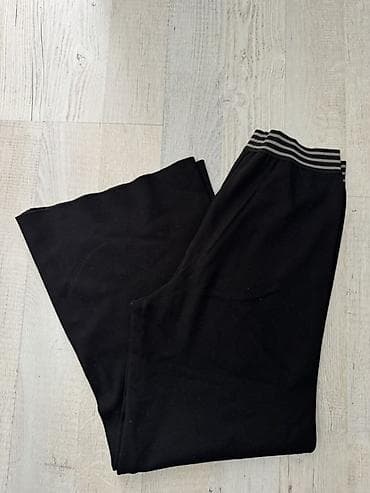 Широкие чёрные брюки укороченные трикотаж at lalafo.kg Широкие чёрные брюки укороченные трикотаж