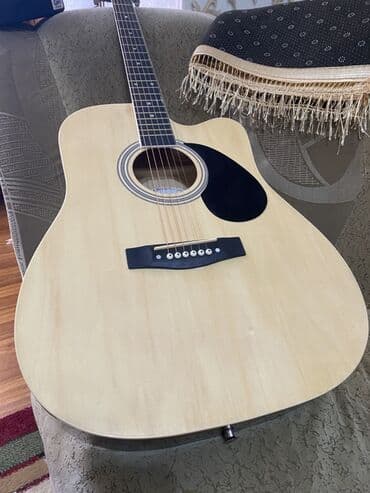 Акустическая гитара формата дредноут с вырезом (cutaway). 41р at lalafo.kg Акустическая гитара формата дредноут с вырезом (cutaway). 41р
