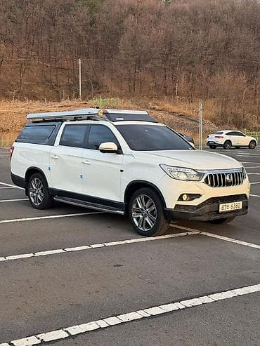 Пикап SsangYong Rexton Sports Khan, белый, с полноценным закрытым at lalafo.kg Пикап SsangYong Rexton Sports Khan, белый, с полноценным закрытым