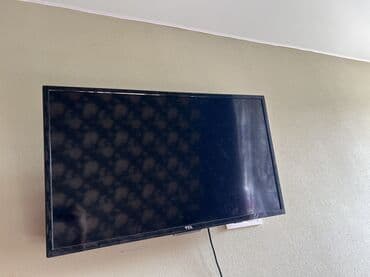 Телевизор TCL, плоская панель, настенное крепление at lalafo.kg Телевизор TCL, плоская панель, настенное крепление
