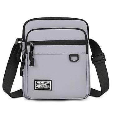 Сумка-мессенджер хорошего качества, целые замки и молнии. Серого цвета at lalafo.kg Сумка-мессенджер хорошего качества, целые замки и молнии. Серого цвета