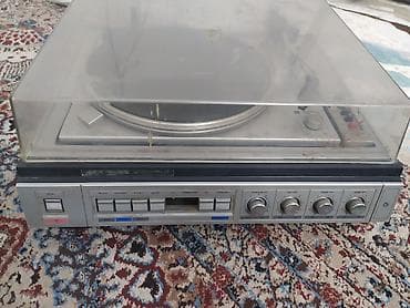 Виниловый стереокомбайн с встроенным усилителем и радиоприёмником - at lalafo.kg Виниловый стереокомбайн с встроенным усилителем и радиоприёмником -