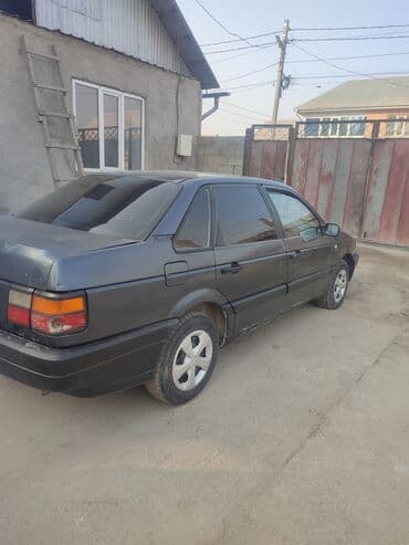 Седан темно‑серого цвета. Кузов 4‑дверный, тонированные стекла по at lalafo.kg Седан темно‑серого цвета. Кузов 4‑дверный, тонированные стекла по