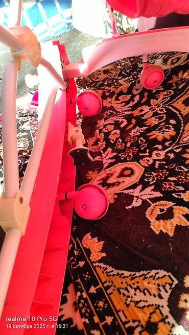 Детские ходунки с игровой панелью и тентом - Яркая розово‑желтая at lalafo.kg Детские ходунки с игровой панелью и тентом - Яркая розово‑желтая