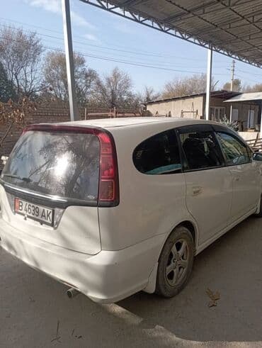 Honda Stream, белый минивэн/универсал. Характеристики и особенности at lalafo.kg Honda Stream, белый минивэн/универсал. Характеристики и особенности