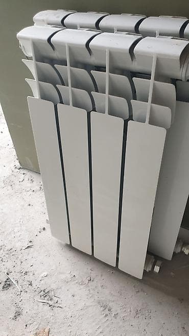 Биметаллический секционный радиатор отопления, белый. не пользовались at lalafo.kg Биметаллический секционный радиатор отопления, белый. не пользовались