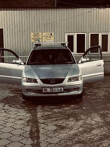 Mazda Capella: 2000 г., 1.8 л, Ручные, Бензин, Универсал at lalafo.kg Mazda Capella: 2000 г., 1.8 л, Ручные, Бензин, Универсал